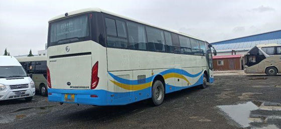 Benutzter Reisebus für Afrika verwendete goldene Airbag-Fahrgestelle-niedrigen Kilometer Dragon Bus Yuchai Rear Engines 233kw 53seats Euro-IV