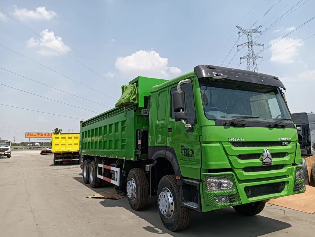 Gebrauchtes Schleppfahrzeug in Simbabwe Sinotruk Howo Leaf Spring 30CBM Box Rechte Handlauf