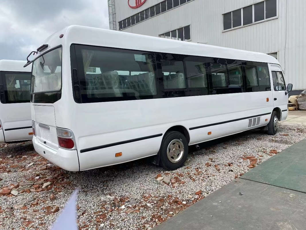 Gebrauchtes Coaster Bus Mudan Minibus 30 Sitzplätze Rechtslenkung Gebrauch in Tansania Leaf Spring Für schlechte Straße