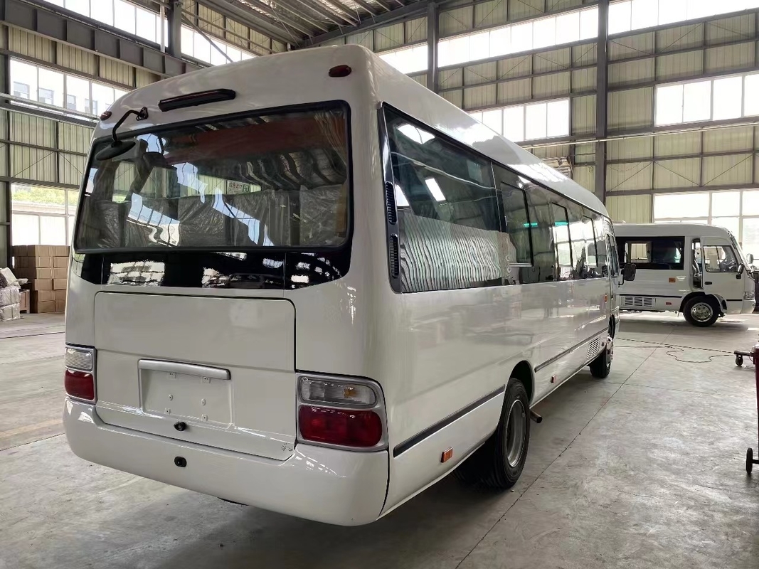 Gebrauchtes Coaster Bus Mudan Minibus 30 Sitzplätze Rechtslenkung Gebrauch in Tansania Leaf Spring Für schlechte Straße