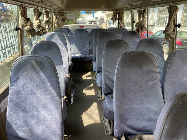 Benutzte benutzte Dieselhandbuch bearbeitete Tür Toyota-Küstenmotorschiff-Mini Buss im Jahre 2011 Jahr transportiert benutzten Luxusbus mit 23 Sitzen
